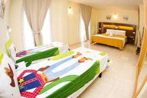 A bed or beds in a room at Hostal San Marcos