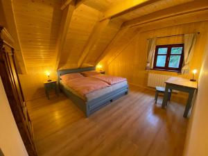 Postel nebo postele na pokoji v ubytování Chata GOLDENBACH