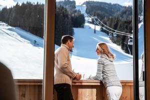 Goście zatrzymujący się w obiekcie ALMGUT - Mountain Wellness Hotel