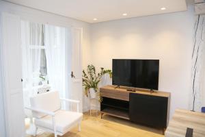 A television and/or entertainment centre at PISO REFORMADO FRENTE A LA CATEDRAL