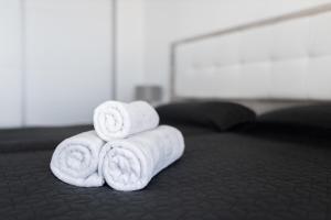 Łóżko lub łóżka w pokoju w obiekcie Levante Sunset Luxury apartment Don Miguel