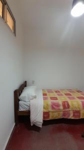 Postel nebo postele na pokoji v ubytování DEPARTAMENTO AMPLIO EN SAN LUIS