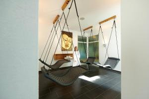 Fitness centrum a/nebo fitness zařízení v ubytování Hotel Bannwaldsee