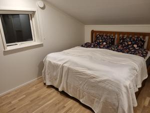 Postel nebo postele na pokoji v ubytování Orust East Coast Villa