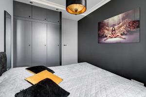 Postel nebo postele na pokoji v ubytování Apartament Gdańsk - In The Sky by Grand Apartments