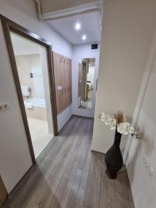 Koupelna v ubytování City Premium Apartments