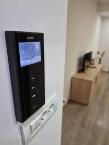 Un televizor și/sau centru de divertisment la City Premium Apartments