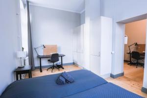 Letto o letti in una camera di Holterman Hostel