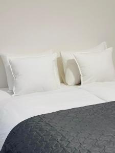 Postel nebo postele na pokoji v ubytování Maria Apartment Liben