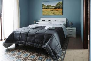 Postel nebo postele na pokoji v ubytování Agriturismo Paradiso