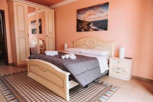 Postel nebo postele na pokoji v ubytování Agriturismo Paradiso