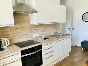 Kuchnia lub aneks kuchenny w obiekcie Wohlfühl-Appartement Kreischberg inclusive Murau SommerGästeCard