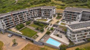 an aerial view of an apartment complex with a courtyard at Modern Ground Floor Studio Apartment in Umhlanga