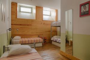 Postel nebo postele na pokoji v ubytování This Is Lisbon Hostel
