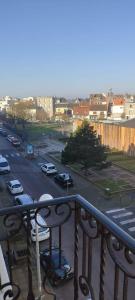 a view of a city with cars parked on the street at Appartement lumineux Berck plage in Berck-sur-Mer