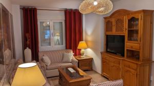 Μια τηλεόραση ή/και κέντρο ψυχαγωγίας στο Casa Moraleda I Vivienda Rural