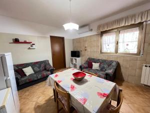 Posezení v ubytování Casa vacanze La Via del Mare + 14 fotografií