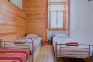 Postel nebo postele na pokoji v ubytování This Is Lisbon Hostel