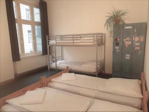 Postel nebo postele na pokoji v ubytování Die Fabrik - Hostel