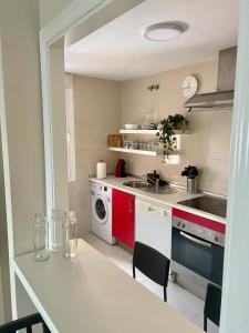 Kuchyň nebo kuchyňský kout v ubytování Apartamento Liru Bormujos, a 5 minutos de Sevilla
