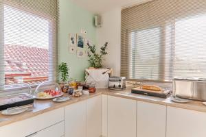a kitchen with a counter with food on it at Ionian Aura in Tsilivi