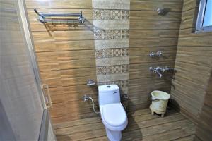 Vannituba majutusasutuses Mahadev Hotel and Resorts