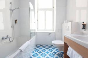 Ein Badezimmer in der Unterkunft Drei Kronen Hotel Wien City