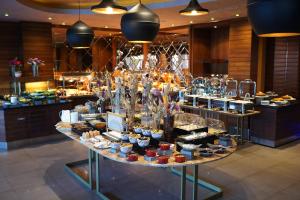 a display of food on a table in a restaurant at Divan Bursa in Bursa