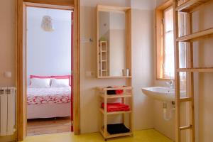 Postel nebo postele na pokoji v ubytování This Is Lisbon Hostel