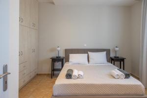 Ένα ή περισσότερα κρεβάτια σε δωμάτιο στο Villa Erato - Private Pool Villa