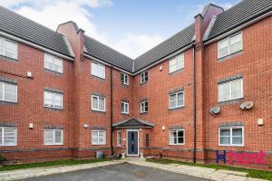 a red brick building with a driveway in front of it at Host Liverpool - Riverside Retreat by centre with private parking in Liverpool