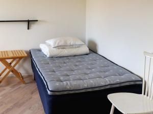 Postel nebo postele na pokoji v ubytování 10 person holiday home in Bua