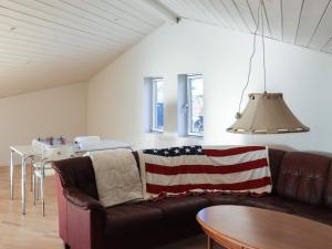 Posezení v ubytování 10 person holiday home in Bua