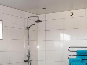 Koupelna v ubytování 10 person holiday home in Bua