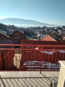 a view of a city from a balcony at VILLA SIMKA in Kočani
