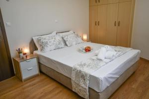 Una cama o camas en una habitación de Angelica Villa