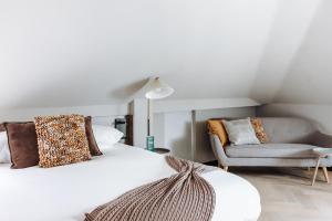 Postel nebo postele na pokoji v ubytování Havendijk Hotel + 37 fotografií