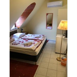 Voodi või voodid majutusasutuse Hotel Balaton Fonyód toas