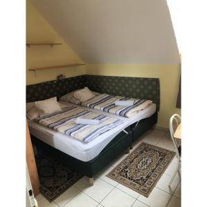 Voodi või voodid majutusasutuse Hotel Balaton Fonyód toas