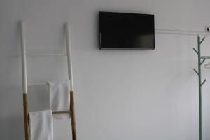 Telewizja i/lub zestaw kina domowego w obiekcie Panoramic Suite Beach