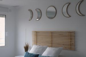 Łóżko lub łóżka w pokoju w obiekcie Panoramic Suite Beach