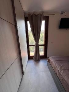 Postel nebo postele na pokoji v ubytování Calypso Home Sea View