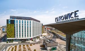 a view of a building with a sign on it at Mercure Katowice Centrum in Katowice