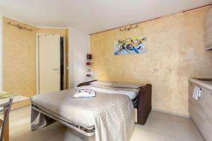 Postel nebo postele na pokoji v ubytování Casetta in Contrada