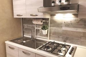 Kuchyň nebo kuchyňský kout v ubytování Casetta in Contrada