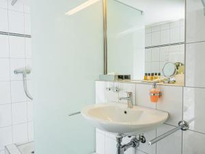 Koupelna v ubytování Hotel Rhyhof