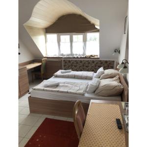 Voodi või voodid majutusasutuse Hotel Balaton Fonyód toas