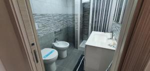 Koupelna v ubytování Giliberto Rooms
