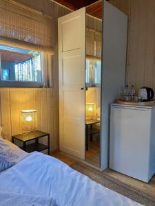 Posteľ alebo postele v izbe v ubytovaní Forest House Augustów