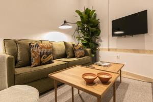 Telewizja i/lub zestaw kina domowego w obiekcie Angeles 6- Giralda Luxury by Valcambre